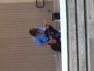 Senior Joshua Fox plays his guitar every morning at school. 