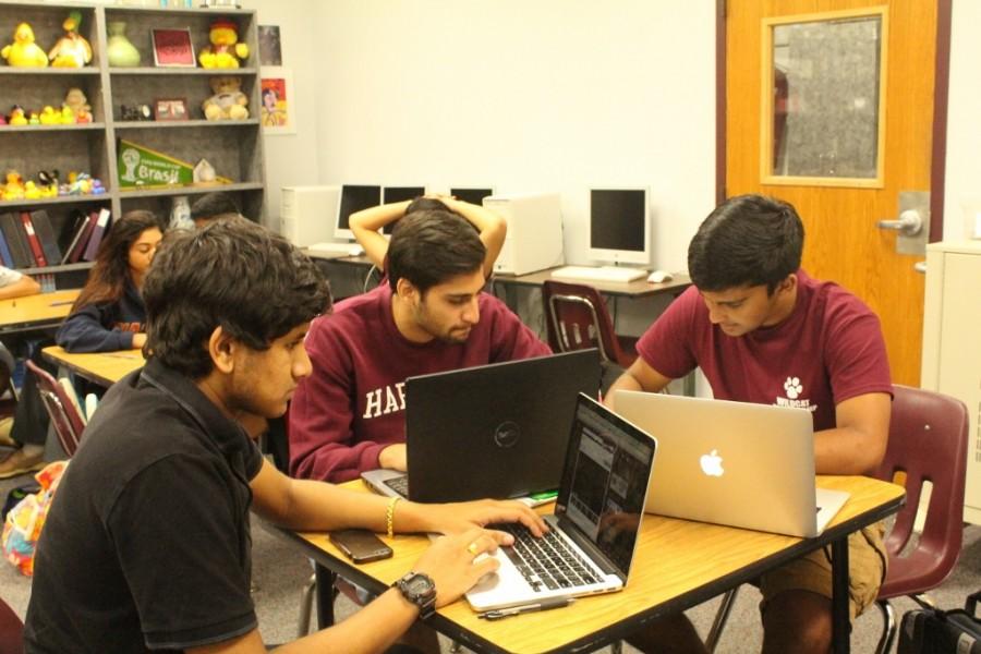 From left to right, debaters seniors Kishan Srikanth, Danial Samani and Sankalp Singh work on pieces during their fifth period debate class. Photo by Rose Rana. 