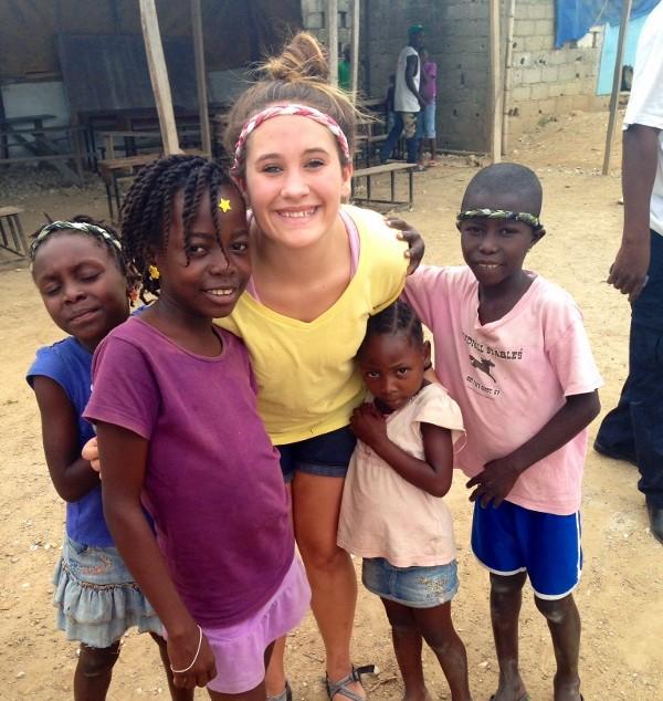 Senior Jenny Bowden poses for a photo as she cares for Haitian orphans for the third year in a row. I definitely connected with the kids, regardless of cultural and language barriers, Bowden said.God has his ways of working with special circumstances.