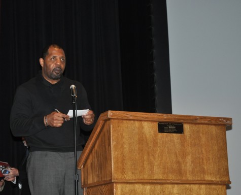 A speaker rises to the podium during the district's first ever law symposium Dec. 1. 