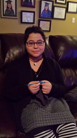 Junior Carla Martinez Crocheting away and making another hat to get out awareness for her cause. "I don't have a main goal," Martinez said. "Getting more awareness that its okay to be any sexuality would be great." Photo submitted by Carla Martinez. 