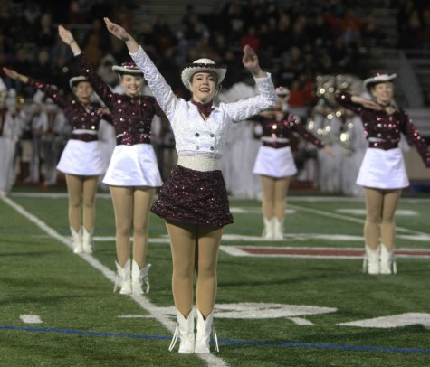 Planoettes perform at halftime of Plano's playoff game against Denton Guyer at Cowboys Stadium last fall. Photo by Terry Quinn.