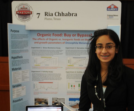 Chhabra at a 2013 science fair. Her most notable project was one that consisted of looking at the rates of stress, fertility and longevity of fruit flies and noticed that all fared better on the organic potatoes and bananas that they were fed. Photo submitted by Ria Chhabra. 
