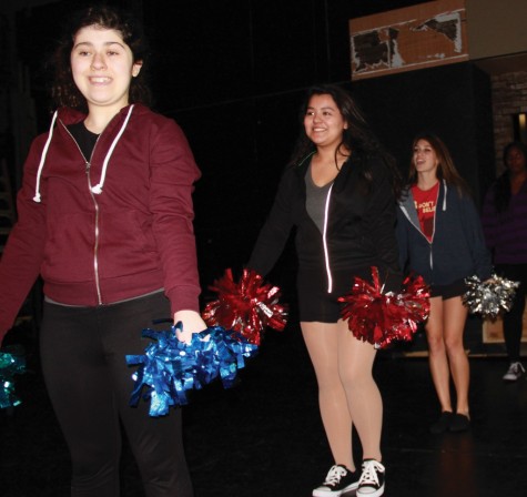 Members of a dance class group prepare for their upcoming performance. Photo by Tashy Hunter. 