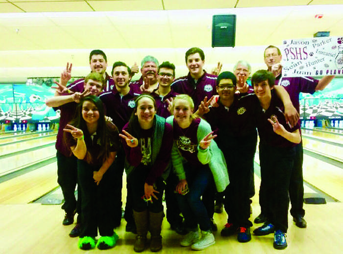 The boys bowling team poses for a photo with members of the girls team after placing second at the regional competition. Sometimes its hard to get everyone together to practice because lots of people have other things going on in their lives, Mandell said. Photo by Wildcat Bowling. 