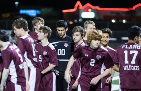 The boys varsity soccer team breaks their huddle following a halftime discussion of tactics. "I know and I wish that I could have done better this past season," Madrigal said. "I am looking forward to tryouts next year and being able to show the coaches my improvements over the off season."  Photo submitted by Jose Madrigal