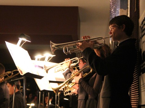 Junior Robert McCullough and other members of the jazz band playing for the crowd.  