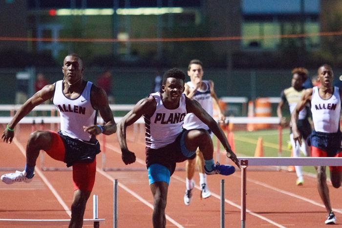 Junior Charles Brockman (right) competes alongside Allen senior Bryce Douglas in the boys 300-meter hurdles at the District 6-6A track and field meet in Flower Mound. (Photo courtesy of Plano Running)