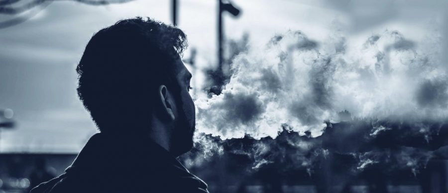 Man+vaping+%28photo+courtesy+of+Pexels+and+altered+by+Ethan+Nguyen%29