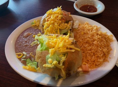 Ojedas delicious puffy taco dinner with rice and beans is a signature dish at the traditional Mexican food restaurant located at 2001 Coit in Plano. (photo by Dylan Kinney)