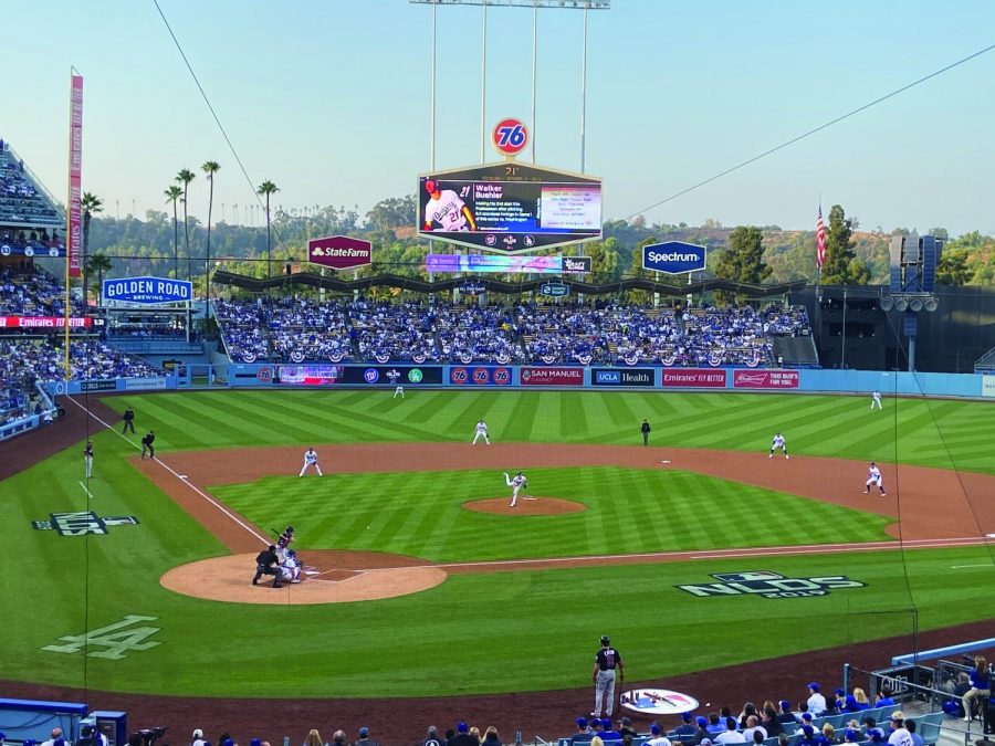 Walker Buehler throwing a pitch to Trea Turner in Game 5 of the National League Division Series.