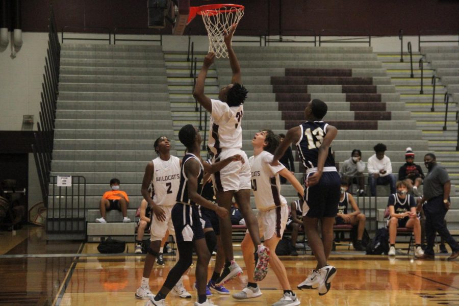 JV Boys Basketball playing at a game