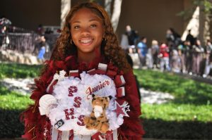 Students show off their mums and garters for a spectacular week