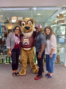Principal Robertson, Assistant Principals Derrian Mckinney and Tracy Ryerson greets the 2025 - 2026 school year with Weston the Wildcat on the Monday before school. 8/15/2025 